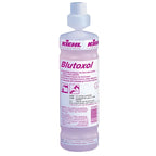 Eine durchscheinend rosa flüssigkeitsgefüllte 1l kiehl blutoxol desinfektionsreiniger-flasche mit weißem verschluss