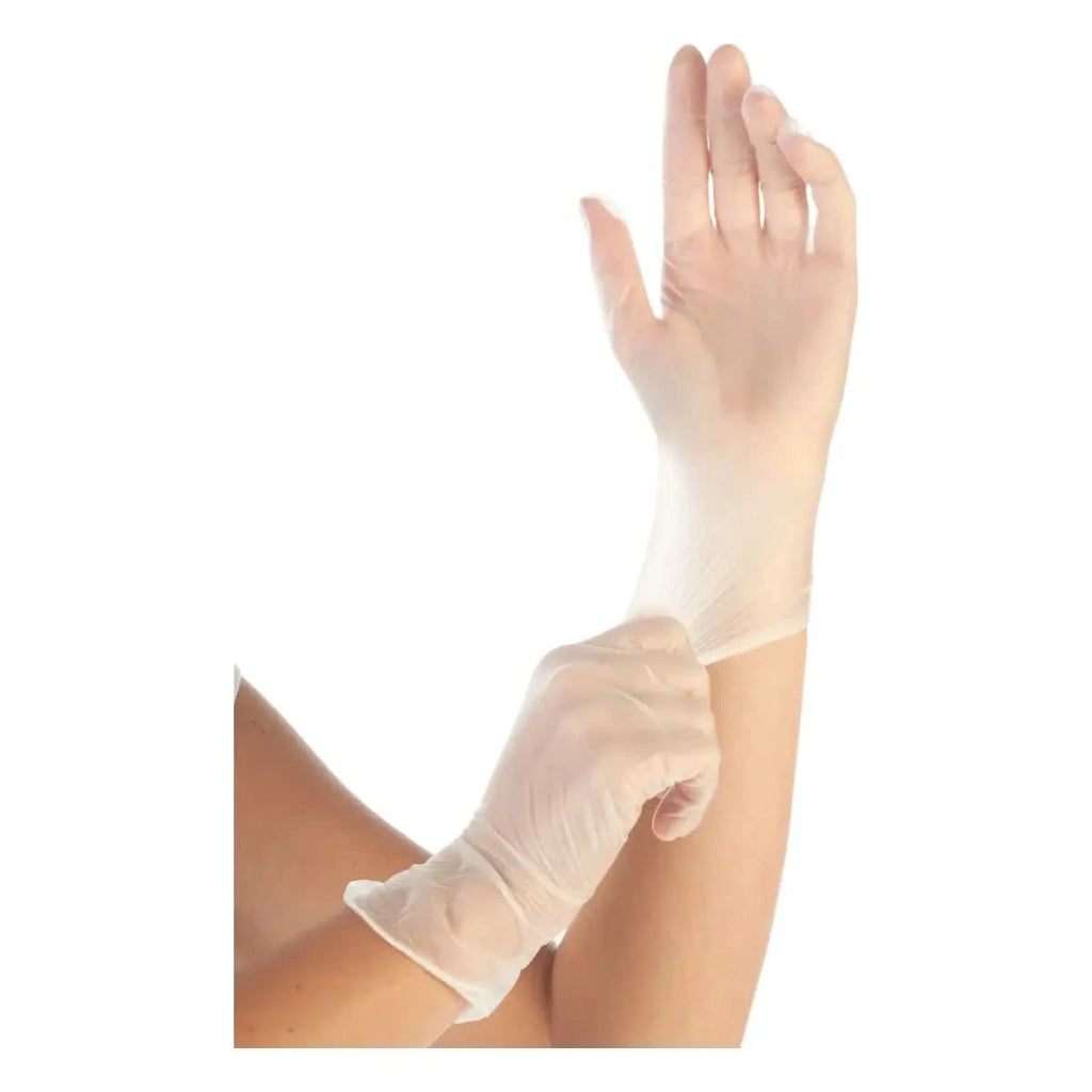 Hand mit klarem, puderfreiem vinyl-handschuh hygonorm ideal light aus latexfreiem material