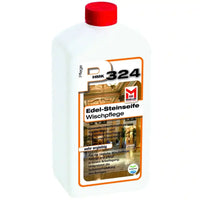 Weiße kunststoffflasche mit rotem deckel und orange umrandetem label für hmk p324 edel-steinseife steinreinigung