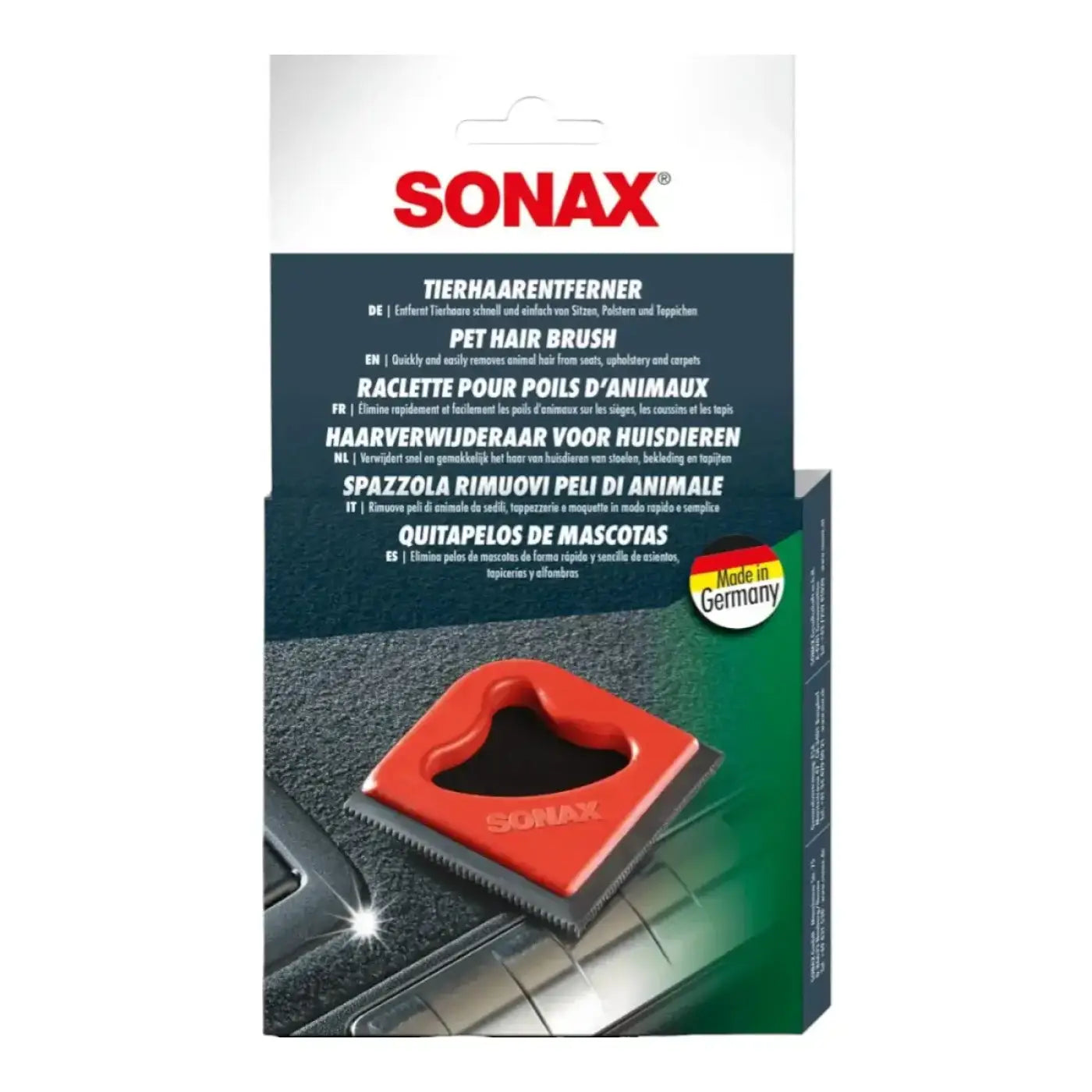 Roter plastik-sonax-tierhaarentferner mit schwarzen borsten für effektive tierhaarentfernung