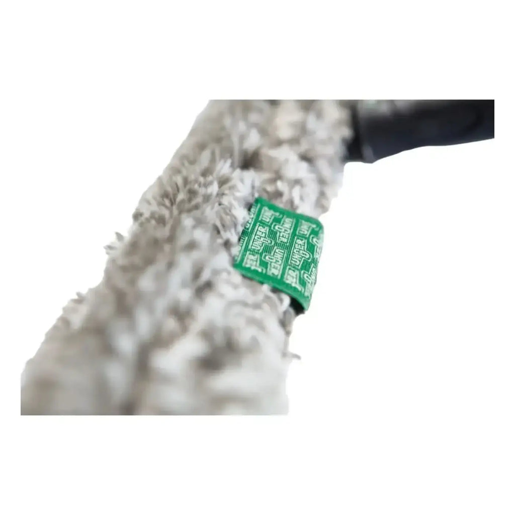 A light gray microfiber mop head with green label for unger ergotec ninja einwascher-bezug nj